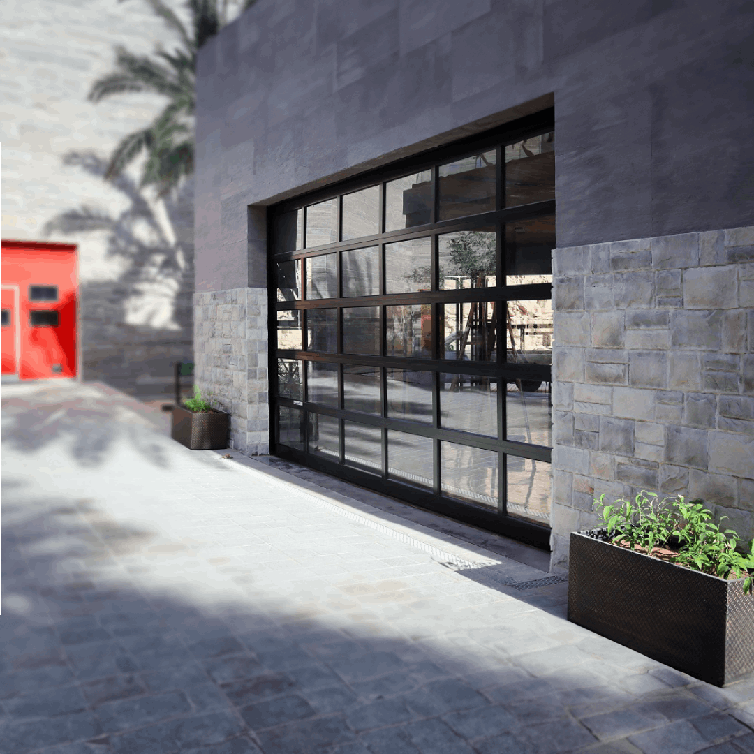 Modern panoramic garage door with sleek design and large glass panels